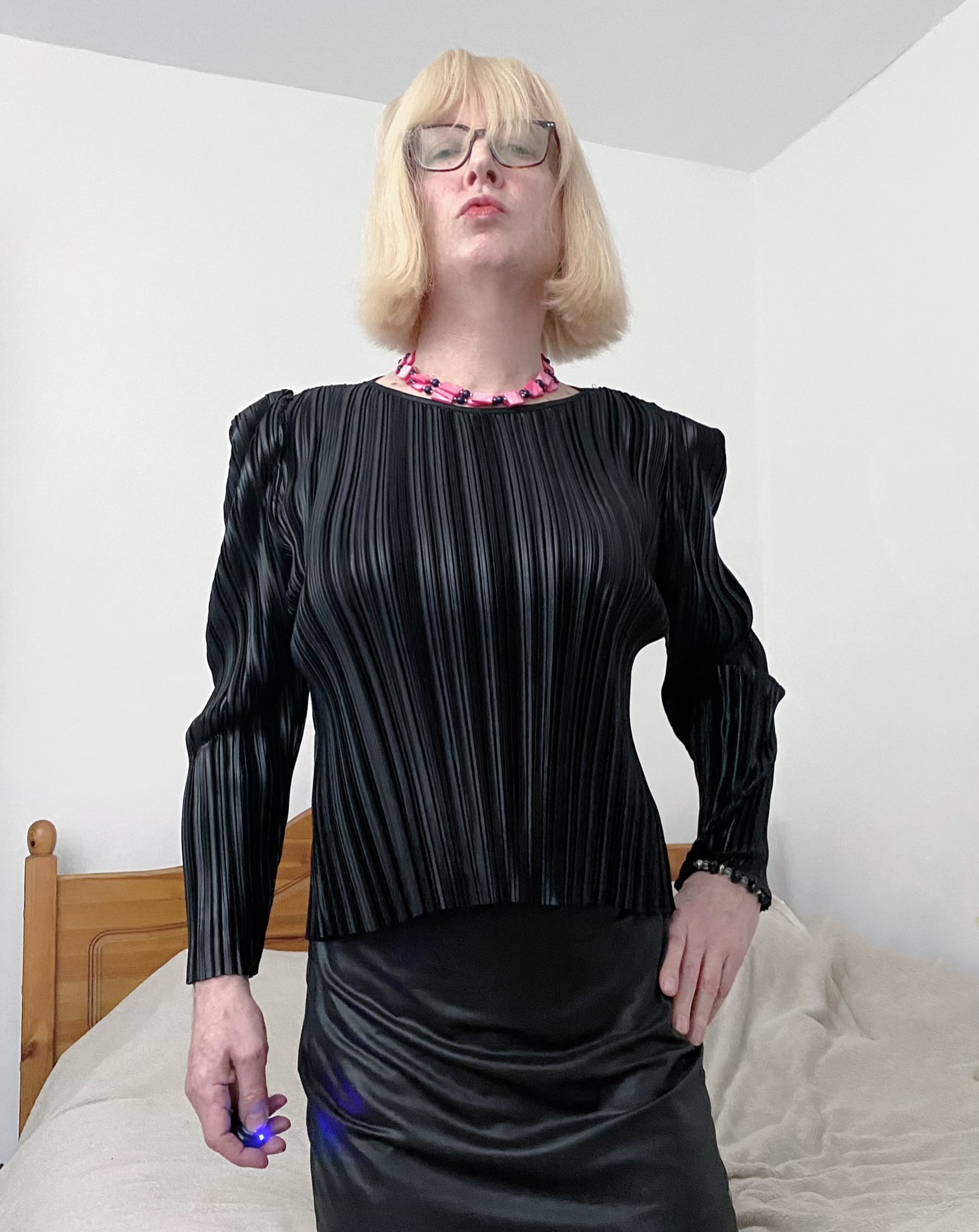 Severe blonde dominatrix in black PVC outfit.  Domination in Cheltenham. Dark tantra.
